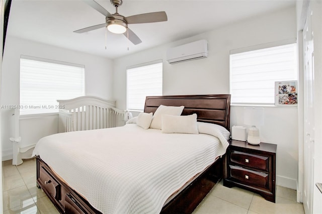 14855 SW 297th Ter, Homestead, FL 33033 - bedroom featuring an AC wall unit, light tile patterned floors, and ceiling fan