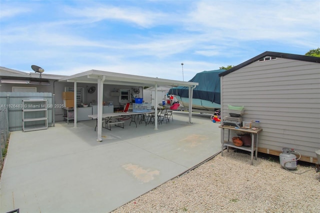 14855 SW 297th Ter, Homestead, FL 33033 - view of patio featuring outdoor dining area and washer / dryer