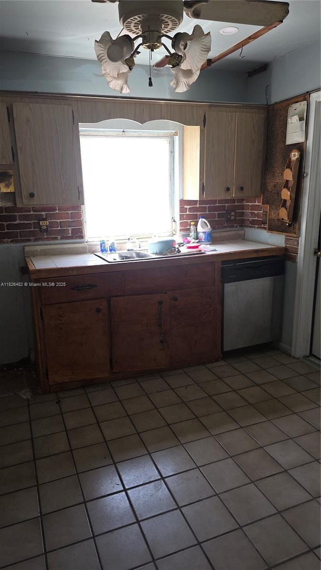 9723 SW 3rd St, Boca Raton, FL 33428 - kitchen with dishwasher, tile counters, light tile patterned flooring, and backsplash
