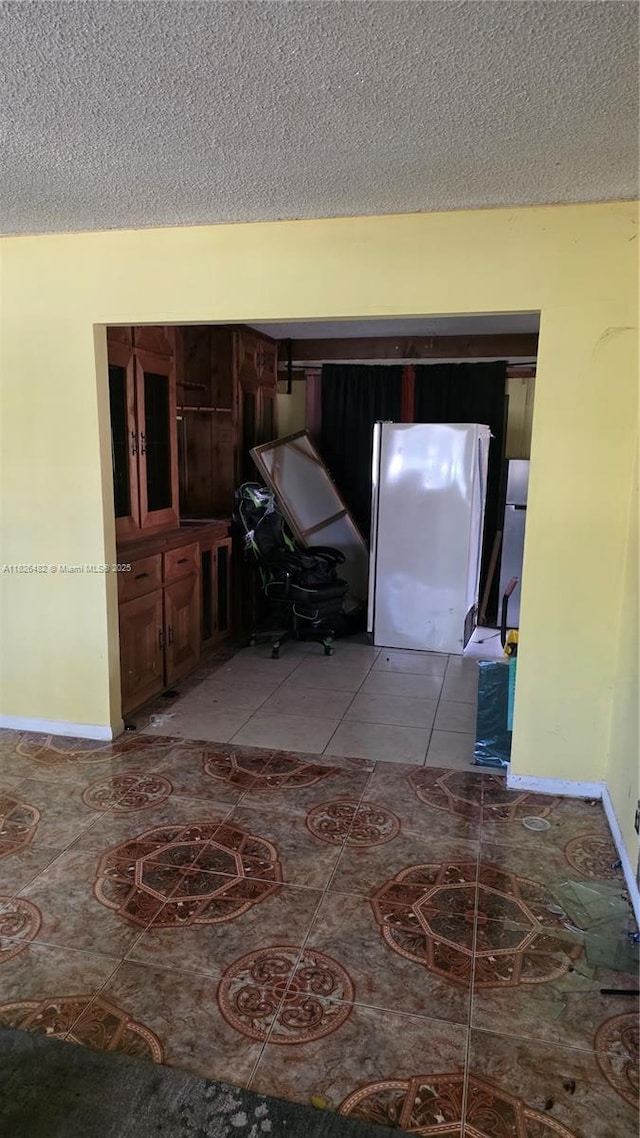 9723 SW 3rd St, Boca Raton, FL 33428 - hall featuring a textured ceiling and light tile patterned floors