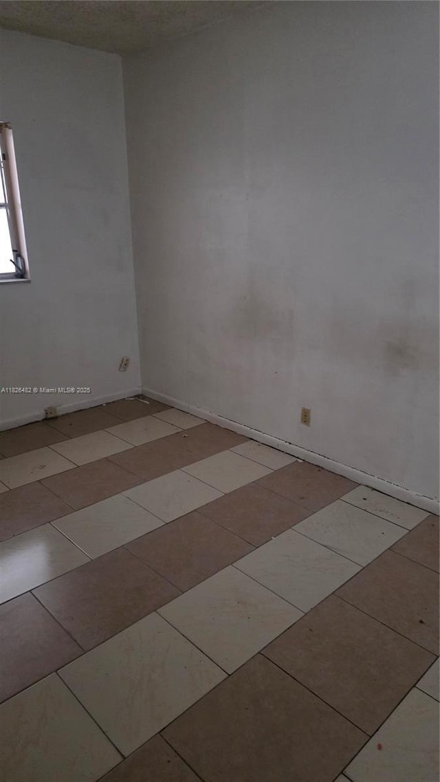 9723 SW 3rd St, Boca Raton, FL 33428 - unfurnished room with light tile patterned floors