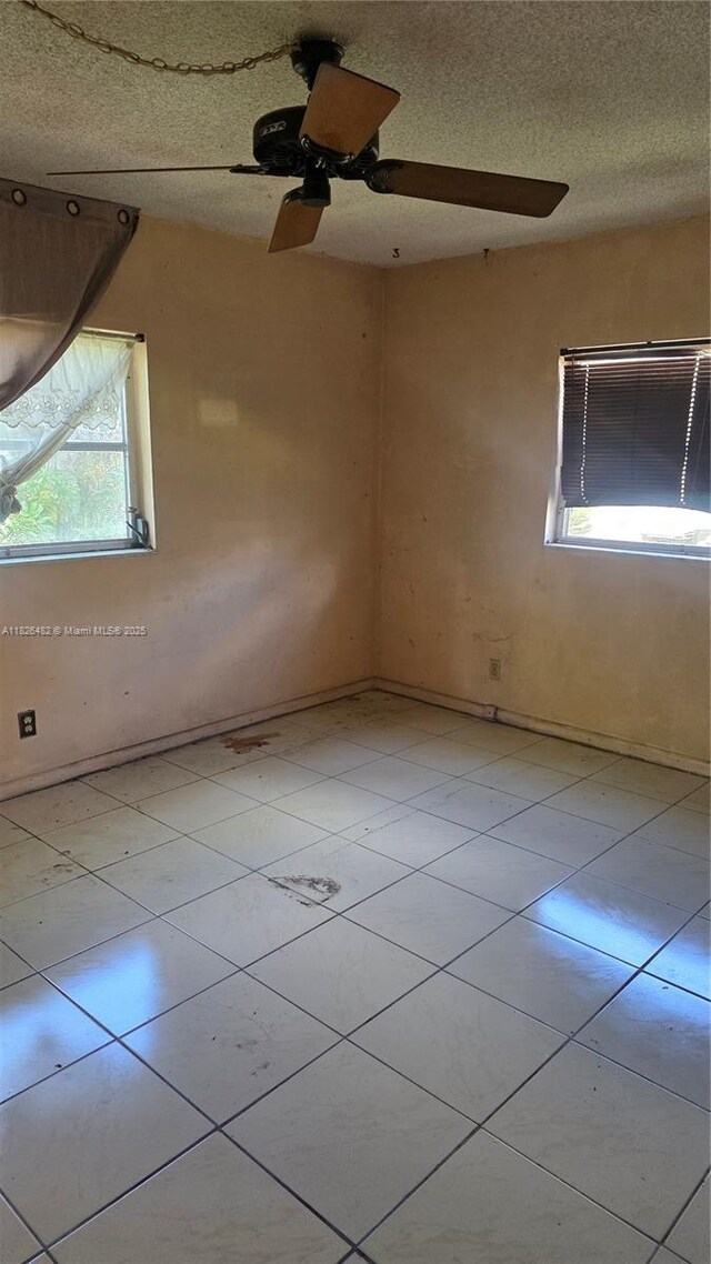 9723 SW 3rd St, Boca Raton, FL 33428 - unfurnished room featuring light tile patterned floors and a ceiling fan