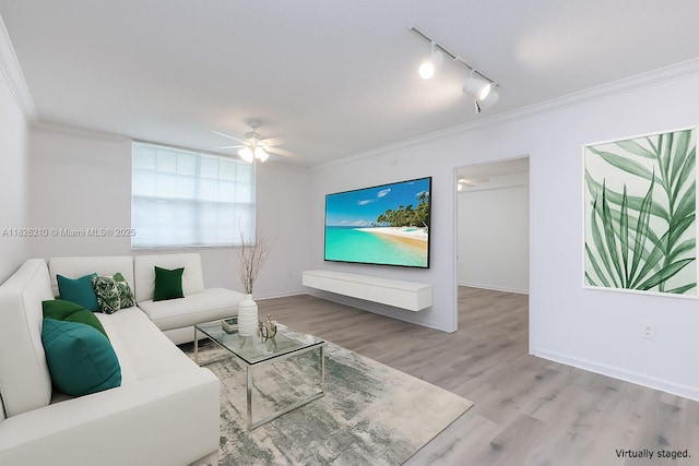 1919 Van Buren St Unit 205A, Hollywood, FL 33020 - living room featuring wood finished floors, crown molding, a ceiling fan, and track lighting