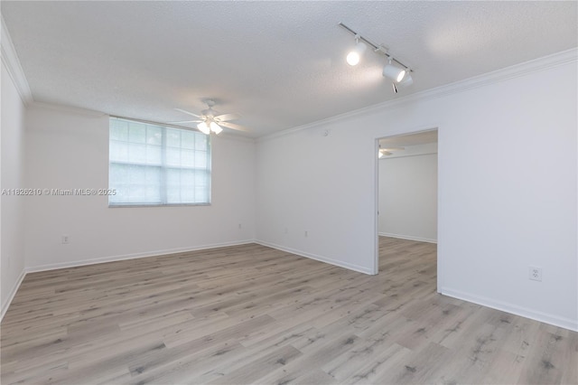 1919 Van Buren St Unit 205A, Hollywood, FL 33020 - empty room featuring a textured ceiling, a ceiling fan, ornamental molding, track lighting, and light wood-style floors