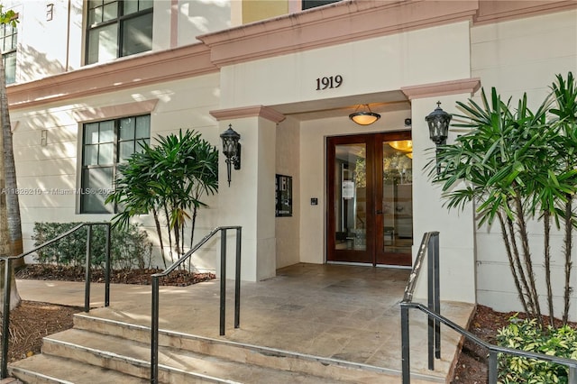 1919 Van Buren St Unit 205A, Hollywood, FL 33020 - doorway to property featuring french doors and stucco siding