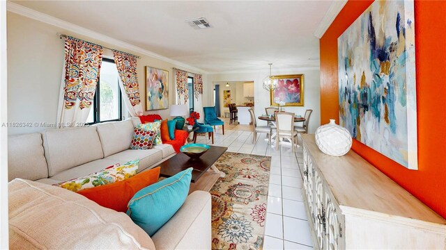10441 SW 150th Ter, Miami, FL 33176 - living area with light tile patterned floors, ornamental molding, and a chandelier