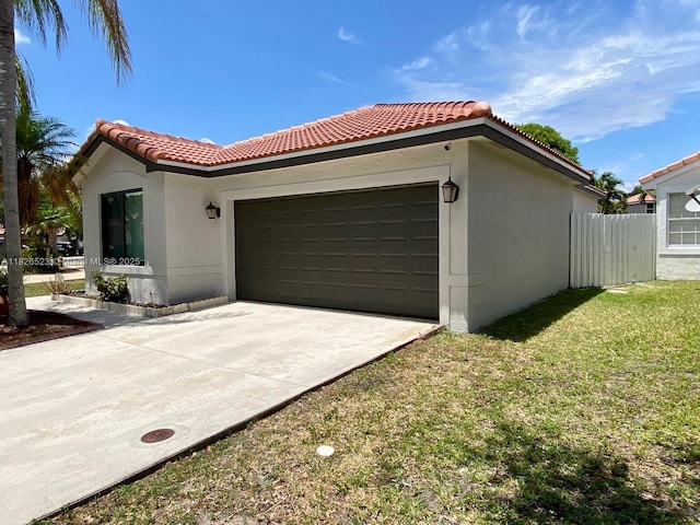 17673 SW 19th St, Miramar, FL 33029 - view of home's exterior with stucco siding, a tile roof, concrete driveway, and a garage