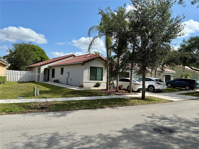 17673 SW 19th St, Miramar, FL 33029 - view of front of home with a tile roof, stucco siding, and driveway