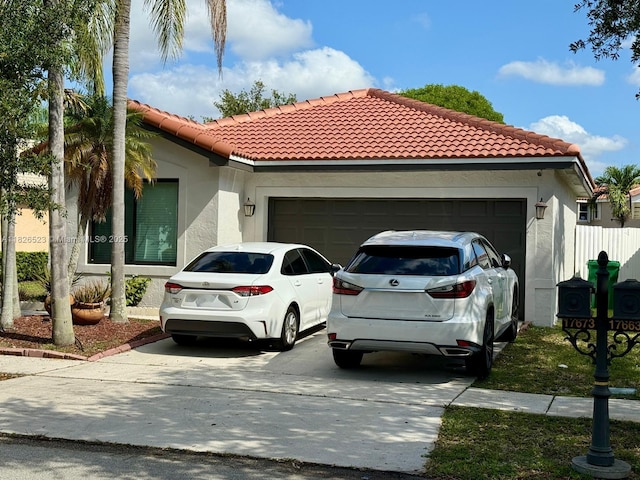 17673 SW 19th St, Miramar, FL 33029 - view of front facade featuring driveway, a tile roof, stucco siding, and an attached garage