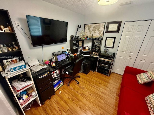 17673 SW 19th St, Miramar, FL 33029 - office with wood finished floors and a textured ceiling