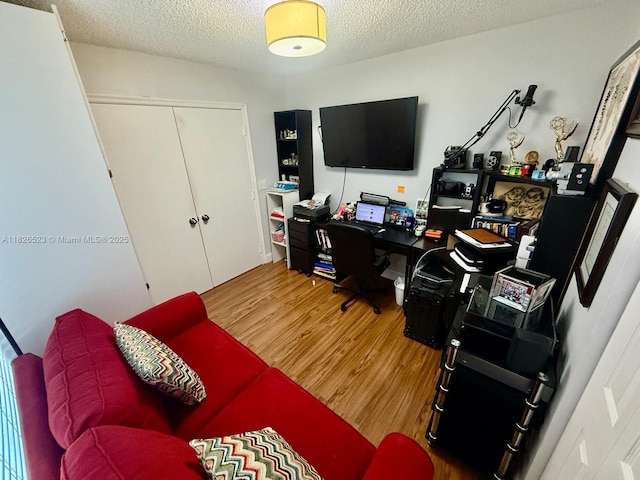 17673 SW 19th St, Miramar, FL 33029 - office area with wood finished floors and a textured ceiling