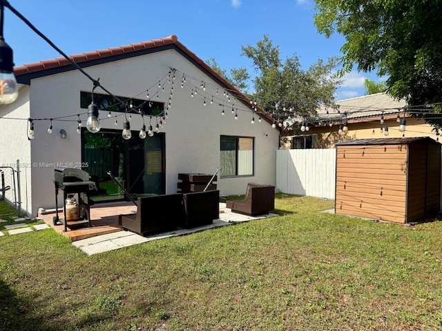 17673 SW 19th St, Miramar, FL 33029 - rear view of property with a shed, an outdoor hangout area, and stucco siding