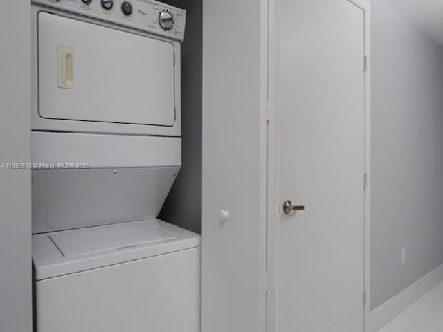 495 Brickell Ave Unit 4205, Miami, FL 33131 - laundry area with stacked washer and clothes dryer