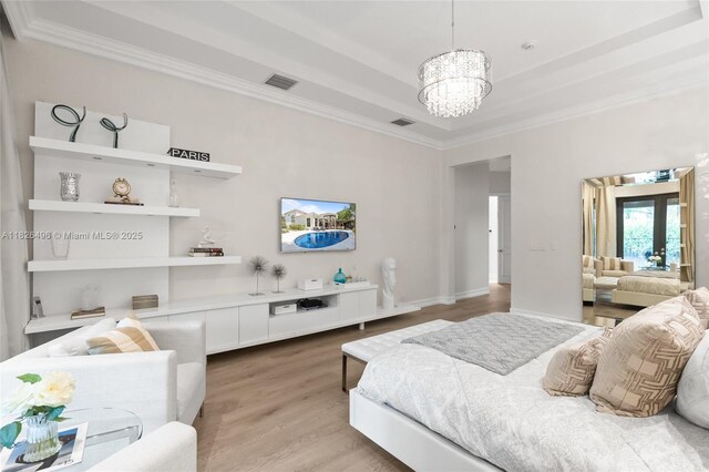 17866 Lake Azure Way, Boca Raton, FL 33496 - bedroom with a chandelier, crown molding, wood finished floors, and a raised ceiling