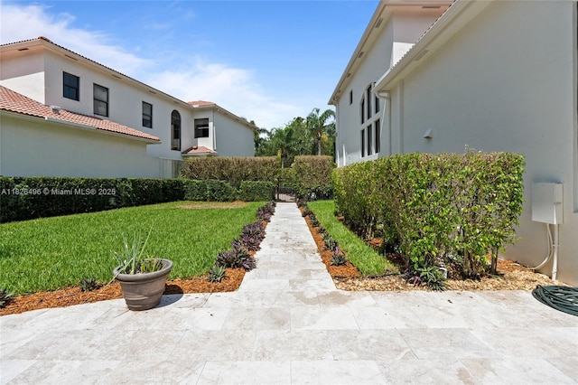 17866 Lake Azure Way, Boca Raton, FL 33496 - view of grassy yard with a patio area