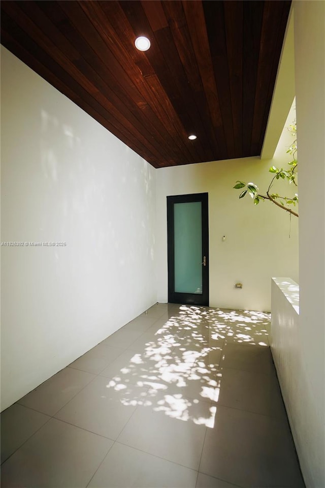 3313 Percival Ave Unit 3313, Miami, FL 33133 - spare room with wooden ceiling, recessed lighting, and tile patterned floors