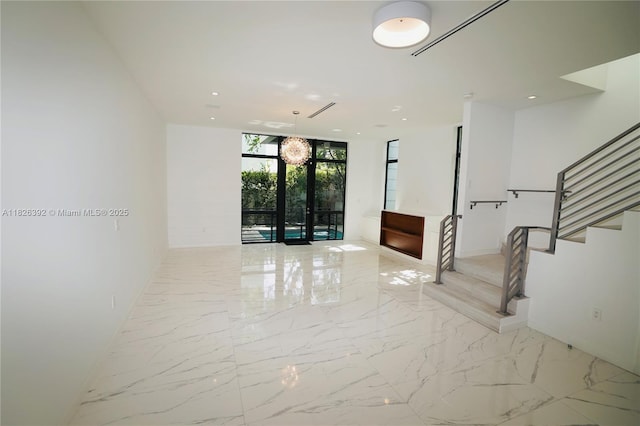 3313 Percival Ave Unit 3313, Miami, FL 33133 - hall featuring stairway, floor to ceiling windows, light marble finish floors, and recessed lighting