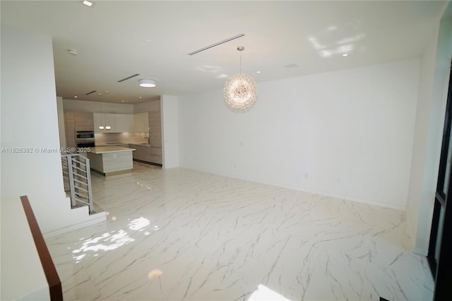 3313 Percival Ave Unit 3313, Miami, FL 33133 - unfurnished living room featuring light marble finish flooring and a chandelier