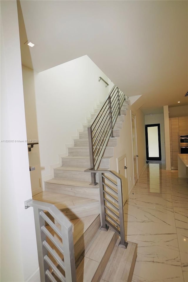 3313 Percival Ave Unit 3313, Miami, FL 33133 - staircase featuring marble finish flooring