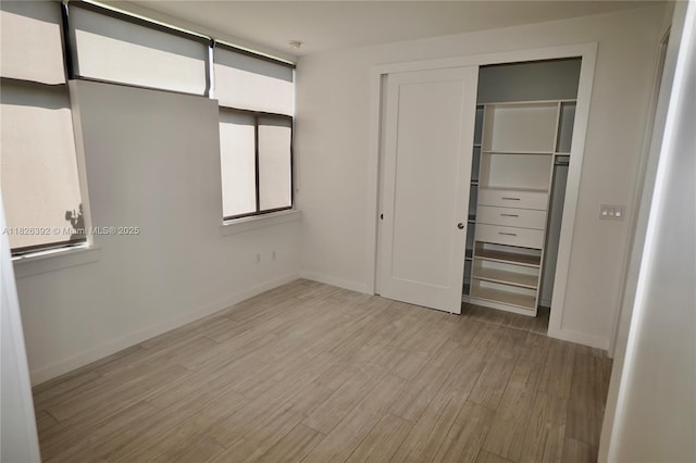 3313 Percival Ave Unit 3313, Miami, FL 33133 - unfurnished bedroom with light wood finished floors and a closet
