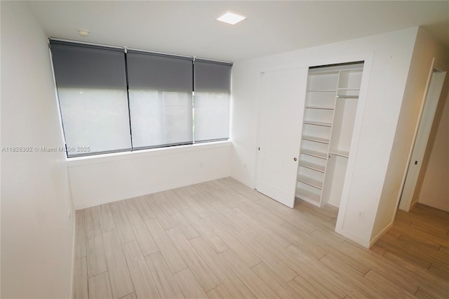 3313 Percival Ave Unit 3313, Miami, FL 33133 - unfurnished bedroom featuring wood finished floors and a closet