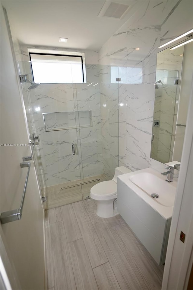 3313 Percival Ave Unit 3313, Miami, FL 33133 - bathroom featuring vanity and a marble finish shower