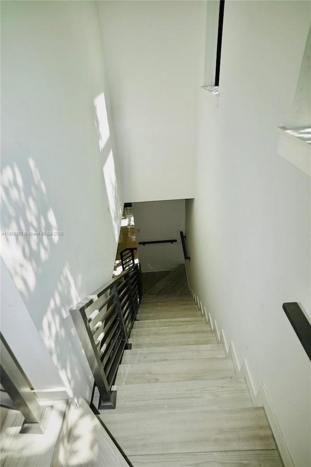 3313 Percival Ave Unit 3313, Miami, FL 33133 - staircase featuring wood finished floors