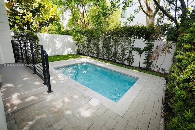 3313 Percival Ave Unit 3313, Miami, FL 33133 - view of swimming pool featuring a fenced backyard and a patio area