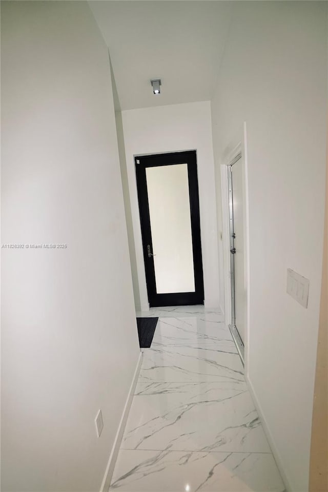 3313 Percival Ave Unit 3313, Miami, FL 33133 - corridor featuring light marble finish floors