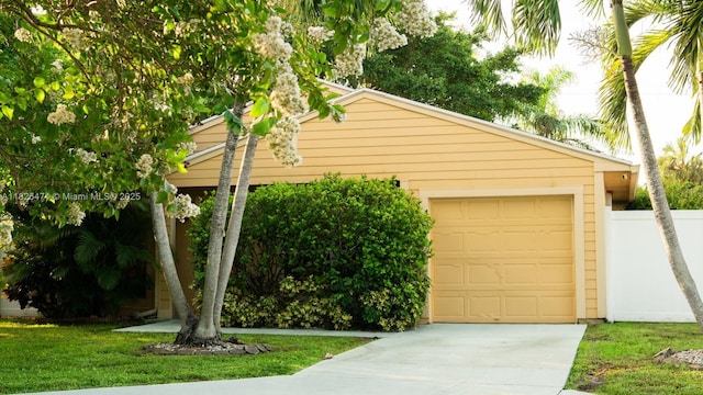 8443 Garden Gate Pl, Boca Raton, FL 33433 - garage featuring concrete driveway
