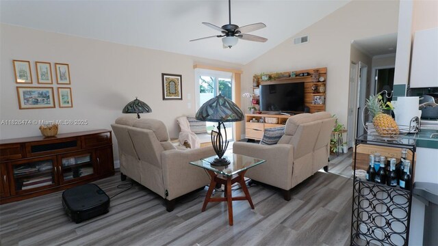 8443 Garden Gate Pl, Boca Raton, FL 33433 - living area with wood finished floors, a ceiling fan, and vaulted ceiling