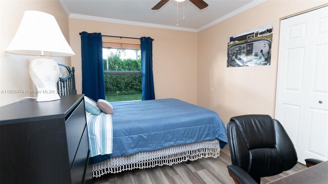 8443 Garden Gate Pl, Boca Raton, FL 33433 - bedroom with wood finished floors, ornamental molding, and a ceiling fan