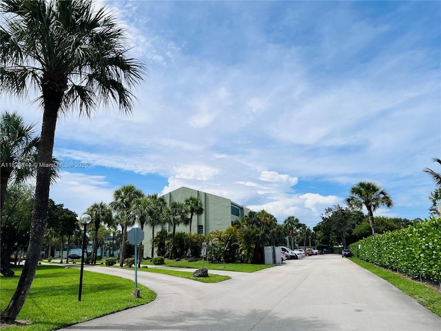 8917 NW 28th Dr Unit C-51, Coral Springs, FL 33065 - view of asphalt street with street lights and traffic signs
