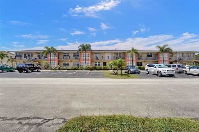 2106 NE 56th Ct Unit 108, Fort Lauderdale, FL 33308 - view of building exterior featuring uncovered parking