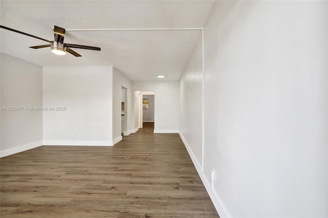 2106 NE 56th Ct Unit 108, Fort Lauderdale, FL 33308 - spare room featuring a ceiling fan, wood finished floors, and recessed lighting