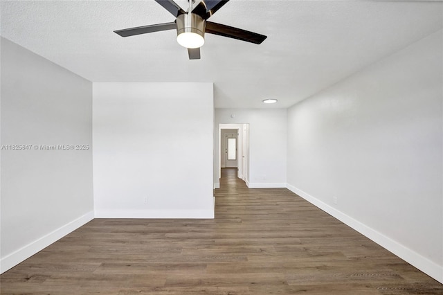 2106 NE 56th Ct Unit 108, Fort Lauderdale, FL 33308 - empty room with ceiling fan and wood finished floors