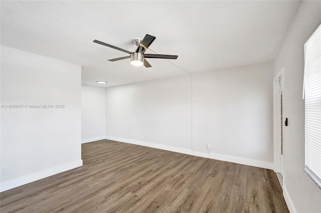 2106 NE 56th Ct Unit 108, Fort Lauderdale, FL 33308 - unfurnished room featuring wood finished floors and ceiling fan