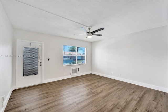 2106 NE 56th Ct Unit 108, Fort Lauderdale, FL 33308 - spare room featuring wood finished floors and a ceiling fan