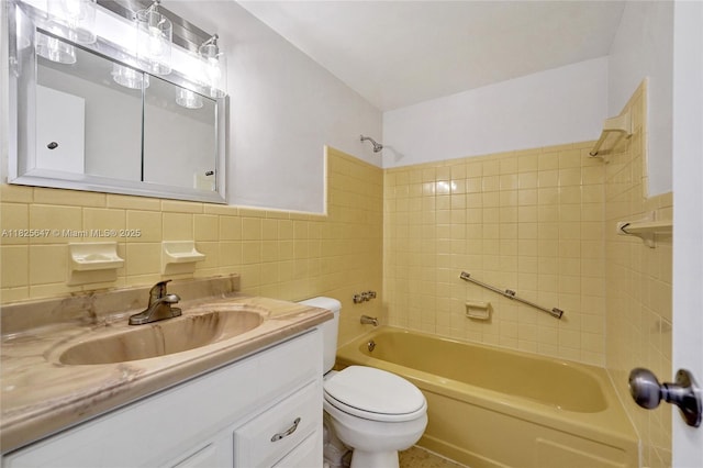 2106 NE 56th Ct Unit 108, Fort Lauderdale, FL 33308 - bathroom featuring tile walls, shower / washtub combination, and vanity