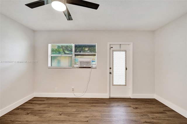2106 NE 56th Ct Unit 108, Fort Lauderdale, FL 33308 - unfurnished room with cooling unit, wood finished floors, and ceiling fan