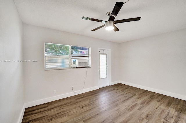 2106 NE 56th Ct Unit 108, Fort Lauderdale, FL 33308 - unfurnished room with a ceiling fan, wood finished floors, and cooling unit