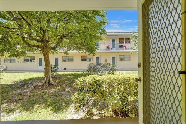 2106 NE 56th Ct Unit 108, Fort Lauderdale, FL 33308 - view of front facade featuring a balcony and stucco siding