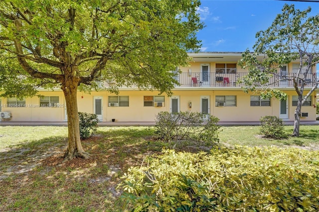 2106 NE 56th Ct Unit 108, Fort Lauderdale, FL 33308 - view of front of property featuring stucco siding and a balcony