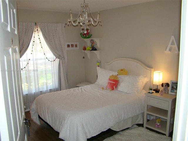 3502 Dunes Vista Dr, Pompano Beach, FL 33069 - bedroom featuring a chandelier and wood finished floors