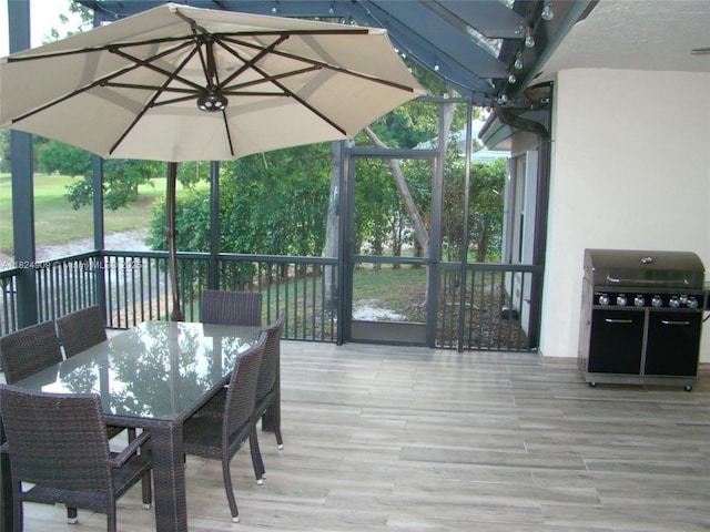 3502 Dunes Vista Dr, Pompano Beach, FL 33069 - wooden deck with a grill and outdoor dining area