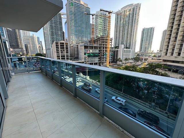 200 Biscayne Boulevard Way Unit 701, Miami, FL 33131 - balcony featuring a view of skyline