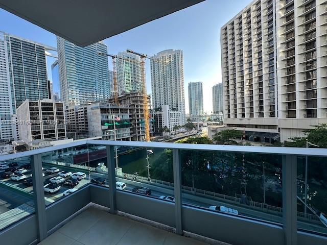 200 Biscayne Boulevard Way Unit 701, Miami, FL 33131 - balcony featuring a view of skyline