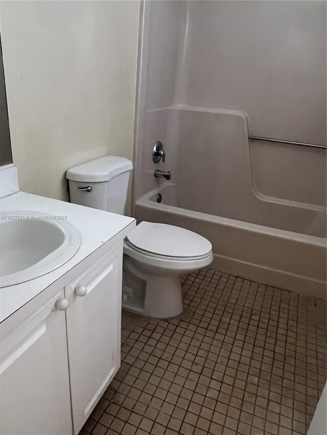 15 Crossings Cir Unit F, Boynton Beach, FL 33435 - full bathroom featuring vanity, tile patterned floors, and shower / washtub combination
