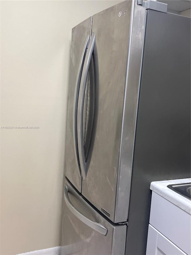 15 Crossings Cir Unit F, Boynton Beach, FL 33435 - laundry view of freestanding refrigerator
