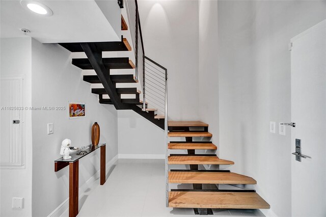7930 E Dr Unit 1806, North Bay Village, FL 33141 - stairs featuring baseboards